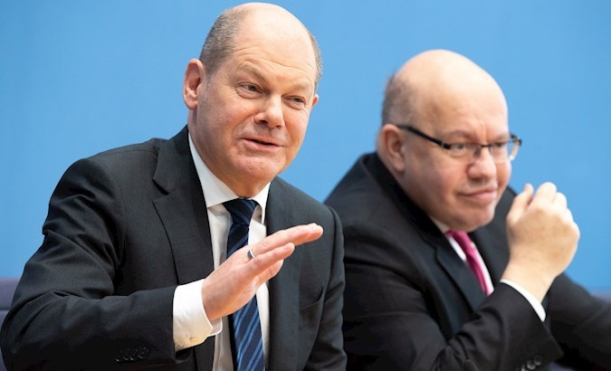 Finance Minister Olaf Scholz (L) and Economics and Energy Minister Peter Altmaier (R) in Berlin, Germany, March 13, 2020.