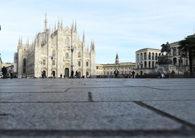 Tourists visit the Milan Cathedral in Milan, Italy, on March 10, 2020.