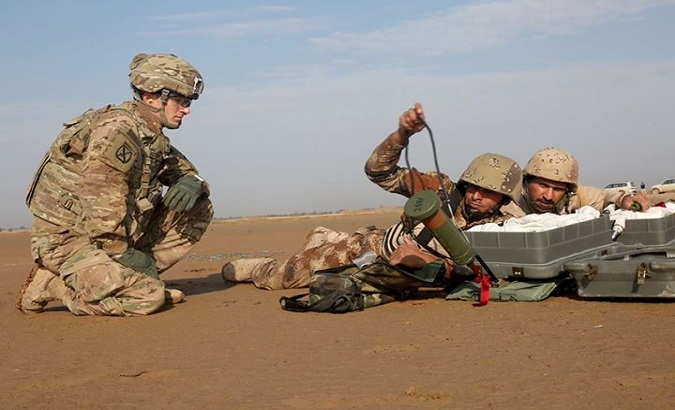 U.S. and Iraqi soldiers during a training excersice at Besmaya Range Complex, Iraq, Nov 10, 2015.