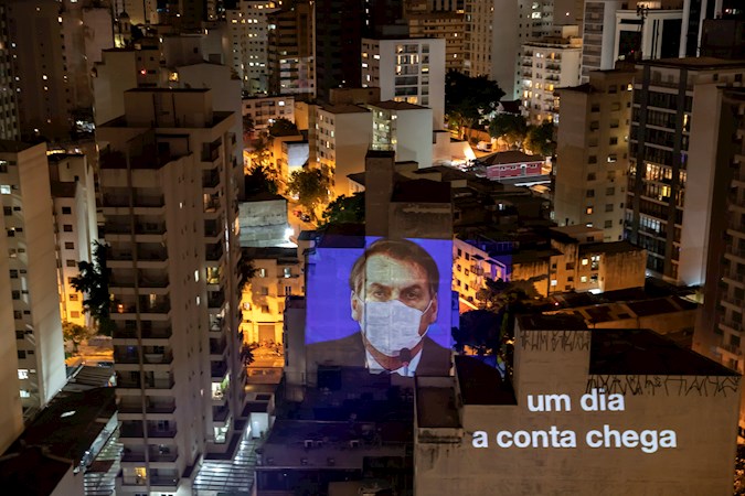View of a projection of the President of Brazil, Jair Bolsonaro, on the facade of a building, during the cacerolazo against the president this Thursday, in Sao Paulo