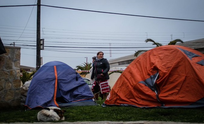 Homeless Chileans live in tents in public spaces