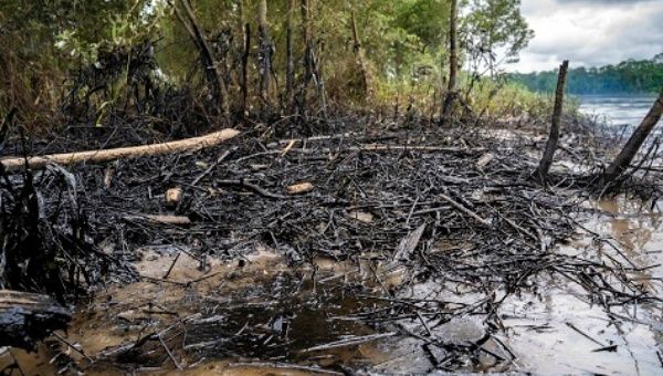 Crude oil on the banks of the river near the city of Coca, Sucumbios, Ecuadorian Amazon, April 10, 2020.