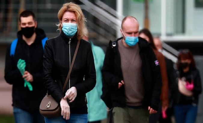 Moscow residents wearing sanitary masks. Moscow, Russia, May 2020.