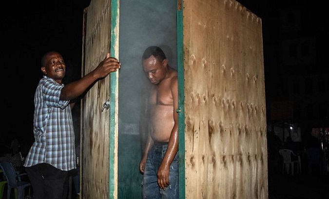 Lemon and ginger steam rooms to prevent COVID-19 in Dodoma, Tanzania. June, 2020.