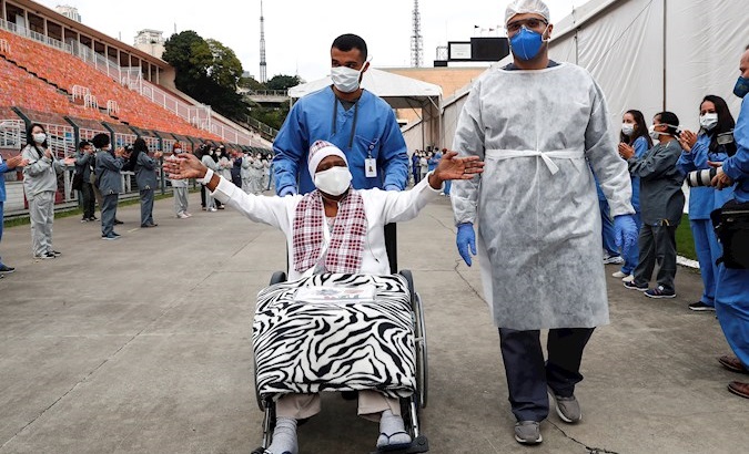 Patient leaves the Pacaembu stadium's field hospital, Sao Paulo, Brazil, June 29, 2020.