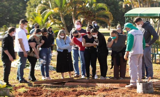Burial of a coronavirus victim, Campo da Esperança cemetery, Brasilia, Brazil, June 10, 2020.