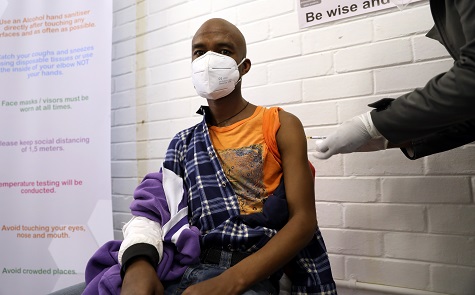 One of the first South African vaccine trialists gets injected, Soweto, South Africa, June 24, 2020.