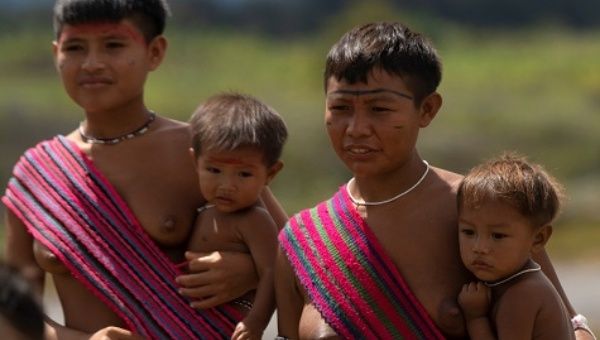 Members of the Yanomami community arrive at a military brigade, Surucucu, Brazil, 2020.