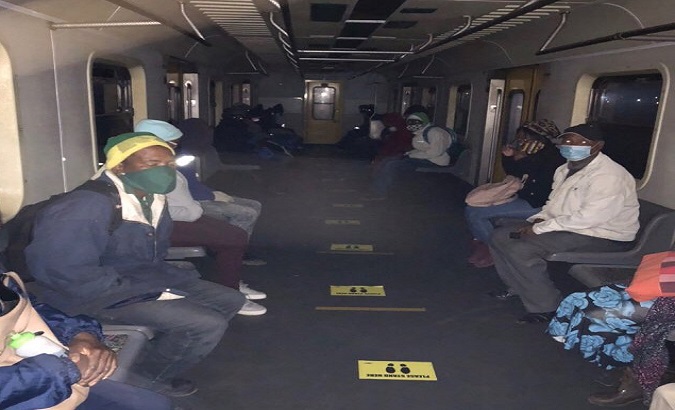 Passengers in Pienaarspoort-Pretoria train. Pienaarspoort, South Africa. July 1, 2020.
