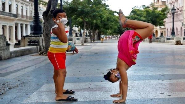 Two children play in a park in Havana, Cuba, July 08, 2020. 
