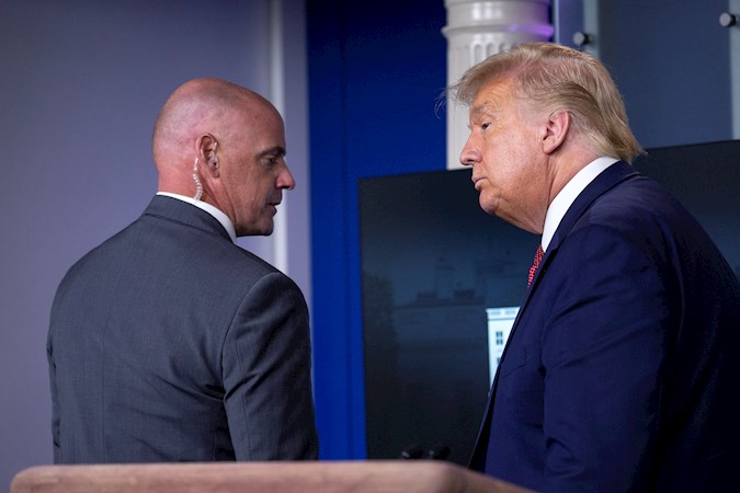 United States President Donald J. Trump is escorted out of a news conference in the James S. Brady Press Briefing Room at the White House in Washington, DC, USA, 10 August 2020.