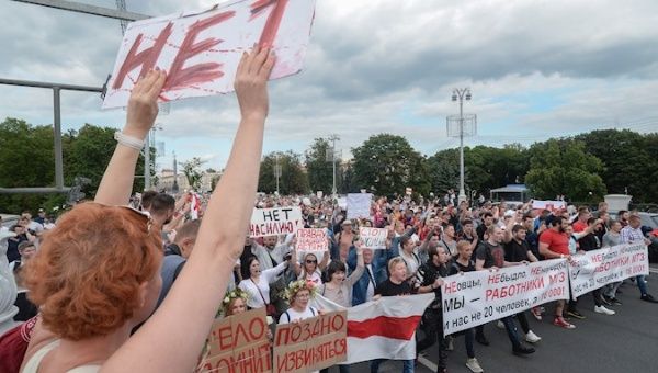 Belarusians attend a rally against the results of the Belarusian presidential election in Minsk, Belarus, 14 August 2020.