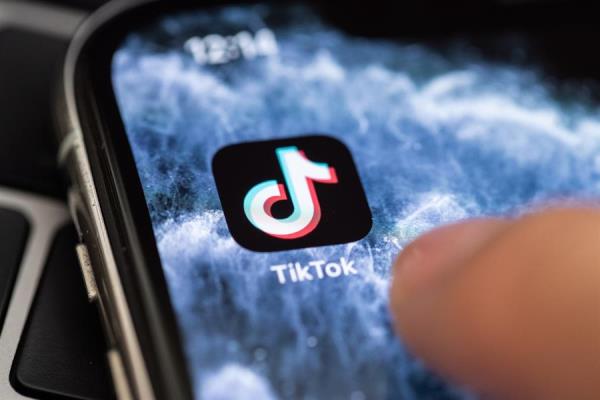 A close-up shows the video-sharing application TikTok on a smart phone. TikTok announced it would launch a court action over Donald Trump's plan to ban the app.