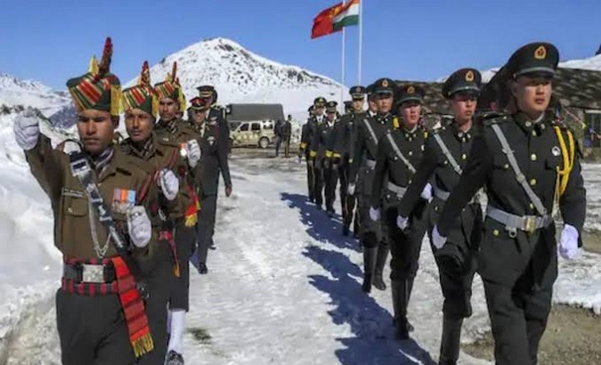 Chinese and Indian soldiers on the border shared by their countries.