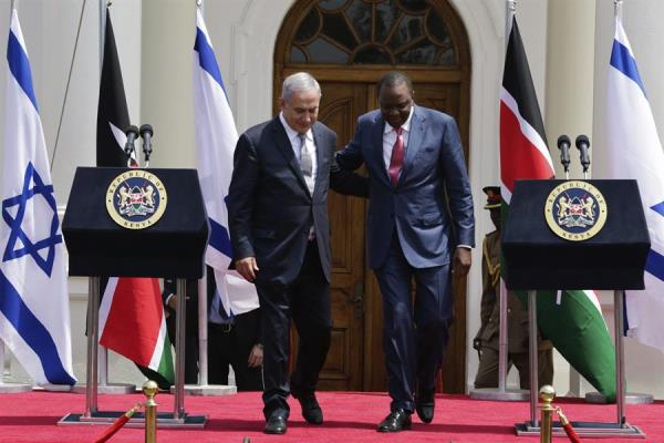 Israeli Prime Minister Benjamin Netanyahu and his Kenyan counterpart Uhuru Kenyatta leave the official presidential residence after offering a press conference Nairobi, Kenya. July 5, 2016.