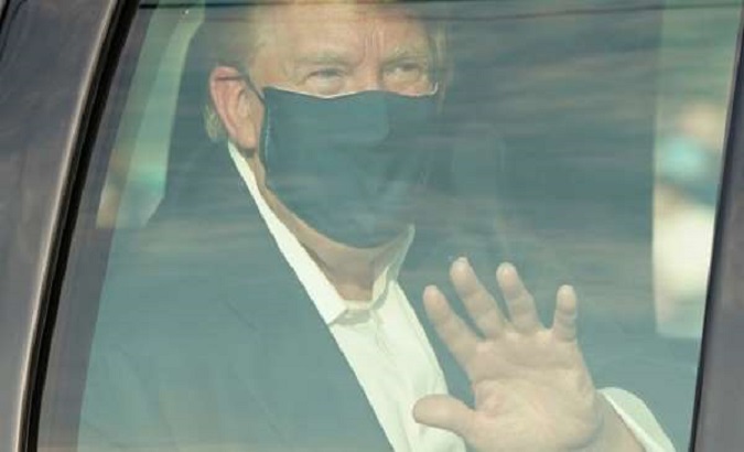 Donald Trump driving past supporters outside the Walter Reed hospital, Maryland, U.S., Oct. 4, 2020.