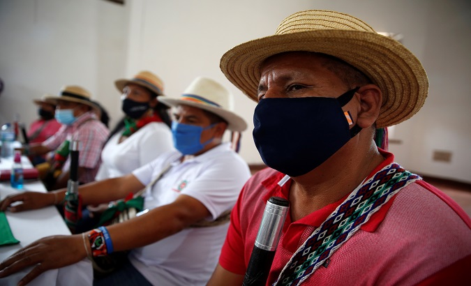 Indigenous authorities participate in a press conference to announce a demonstration against the frequent killings in Cali, Colombia. October 9, 2020.