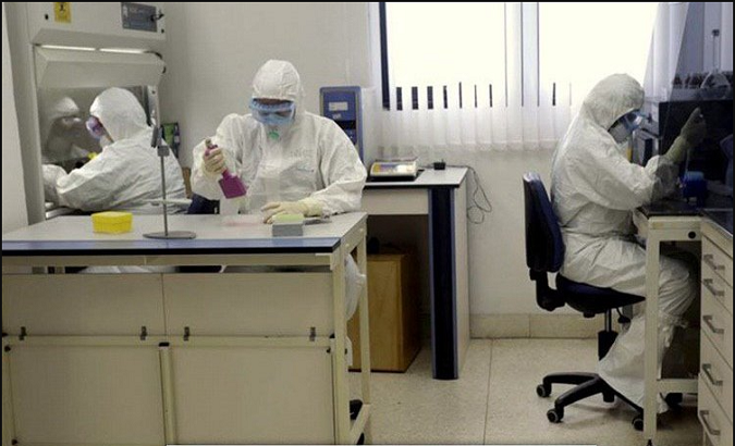 Scientists work at the Finlay Institute of Vaccines, Havana, Cuba, Oct.18, 2020.