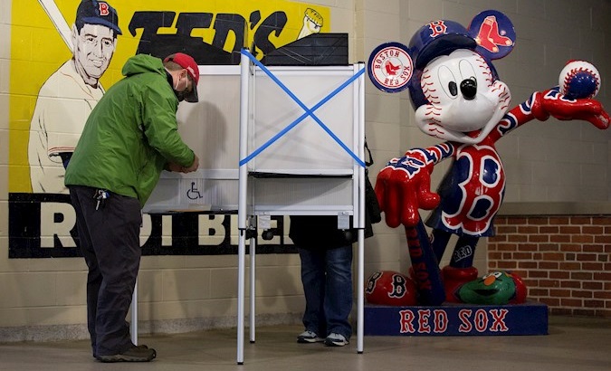 Boston residents cast ballots during early voting inside Fenway Park, Boston, USA, Oct. 17, 2020.