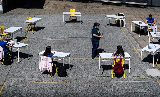 Seniors from a high school attend classes, Buenos Aires, Argentina, Oct. 13, 2020.