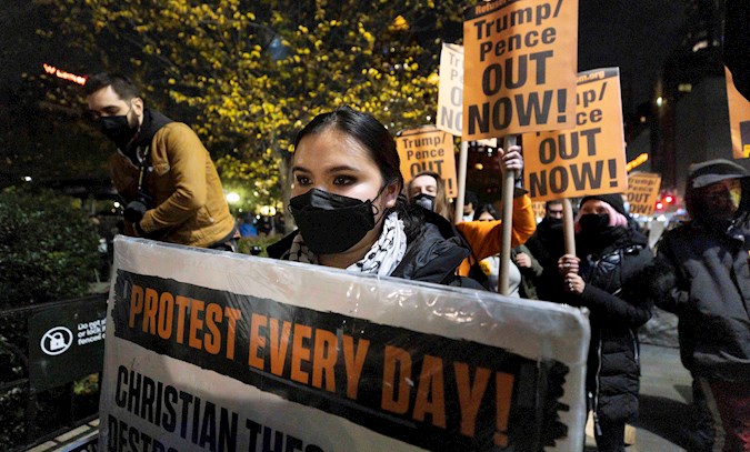 A group of anti-Trump protesters march through lower Manhattan as results in the presidential election continued to be reported in New York, New York, USA. November 03, 2020.