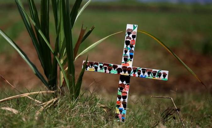 A cross in the valley where five young people were killed on August 11 in Cali, Colombia.