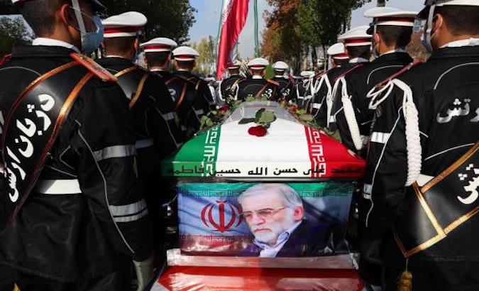 Soldiers carry the coffin of slain Iranian nuclear scientist Mohsen Fakhrizadeh, Tehran, Iran, Nov. 30, 2020.