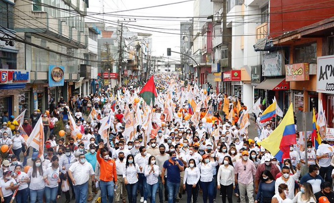 Andrez Arauz (C) leads a march in Santo Domingo city, Ecuador, Nov. 30, 2020.
