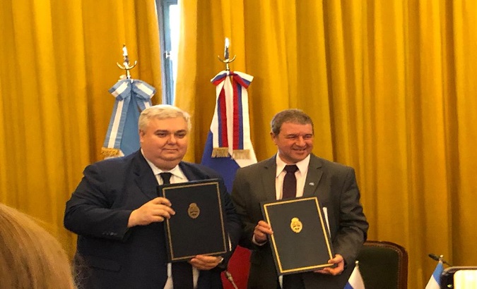 Roscosmos Deputy-Director Mikhail Khailov (L) and CONAE Director Raul Kulichevsky (R), Buenos Aires, Argentina, Oct. 8, 2019.