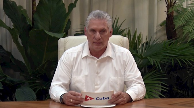 Image taken from the television of Cuban President Miguel Diaz-Canel during the announcement of the start of the monetary unification process