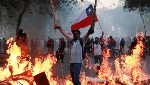 Protesters took to the streets to demand social reforms, Santiago, Chile, 2019.