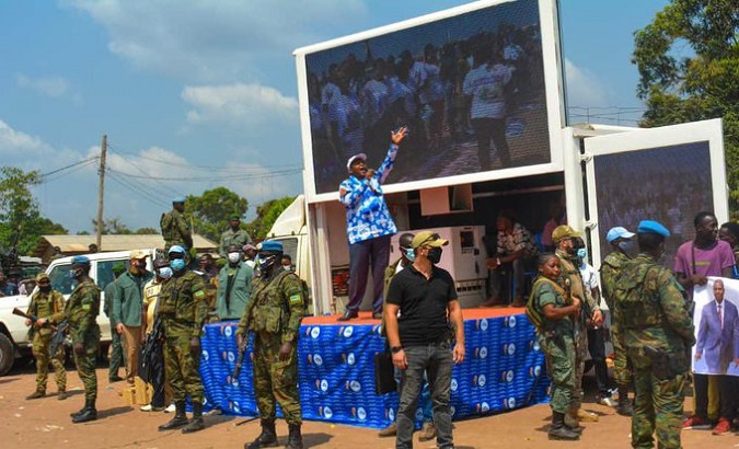 The President of Central African Republic in an electoral campaign being protected by the Rwandan Army, Dec. 2020.