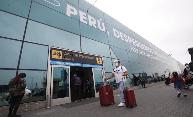 Travelers arrive at Jorge Chavez International Airport, Lima, Peru, Oct. 5, 2020