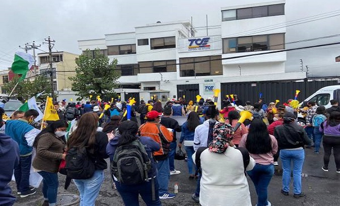 Social Justice Movement's supporters gathered at the Electoral Contentious Tribunal office, Quito, Ecuador, Dec. 4, 2021.