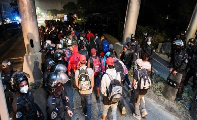 Migrants head north, San Pedro Sula, Honduras, Jan. 15, 2021.
