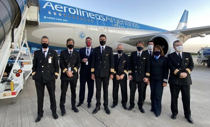 Aircraft crew prepares to depart to Russia, Argentina, Jan. 14, 2020.