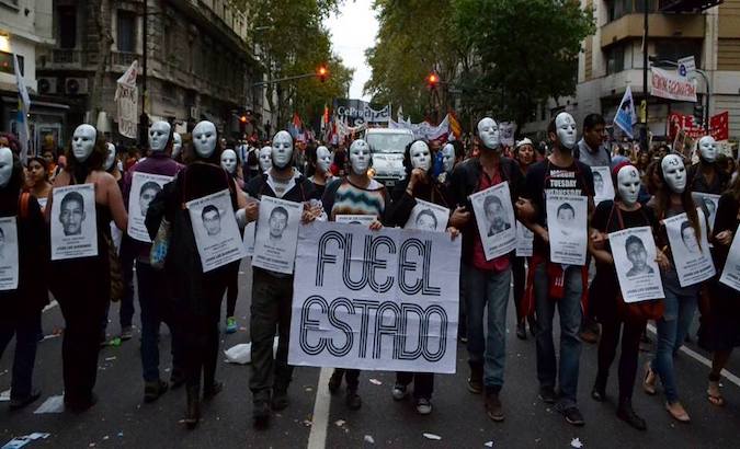 People demand justice for the Ayotzinapa students, Mexico City, Jan. 12, 2021.