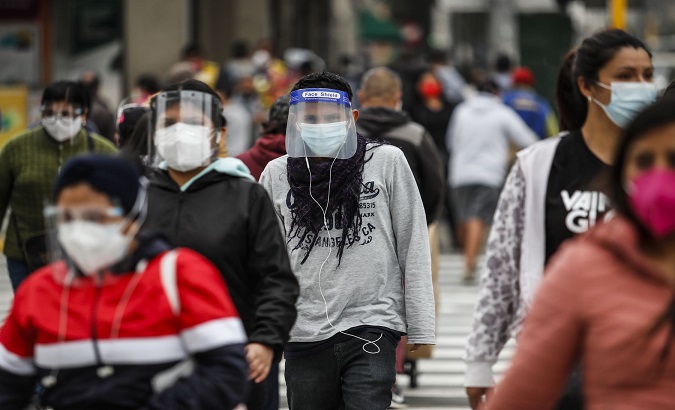 People wear face masks to walk in public spaces, Peru, 2021.