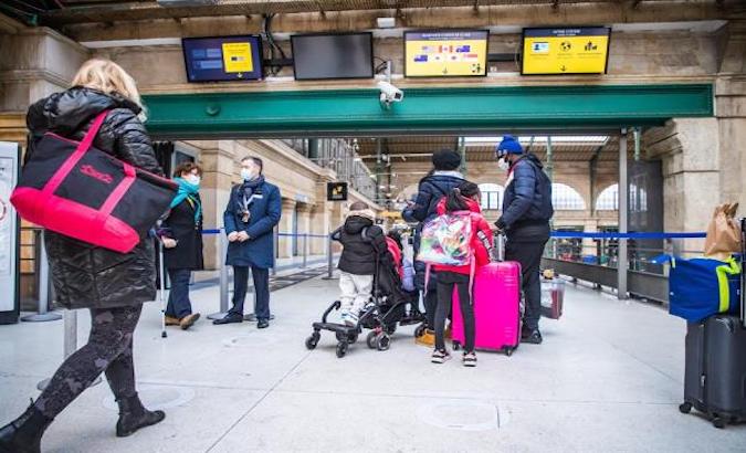Travelers wait to board a plane to the U.S., Madrid, Spain, Jan. 23, 2021.