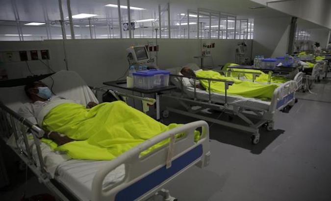 COVID-19 patients are treated in a hospital in San Salvador, El Salvador, Feb.