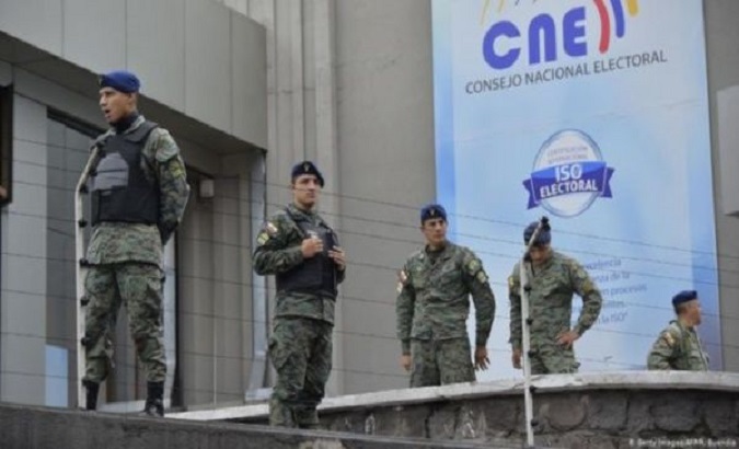 Police forces outside the National Electoral Council (CNE), Quito, Ecuador, Feb. 19, 2021.