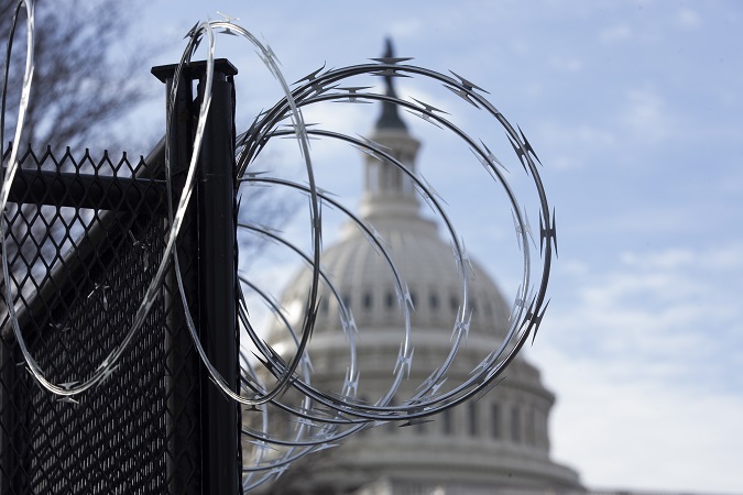 Razor wire atop fencing is seen outside the US Capitol on the first day of the Senate impeachment trial against former US President Donald J. Trump, in Washington, DC, USA, 09 February 2021.
