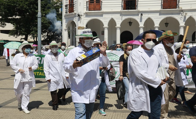 Health workers took to the street, Santa Cruz, Bolivia, Feb. 25, 2021.