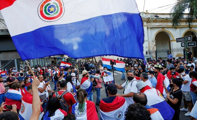 Citizens demanding President Abdo's resignation in the streets of Asuncion, Paraguay, March 6, 2021.