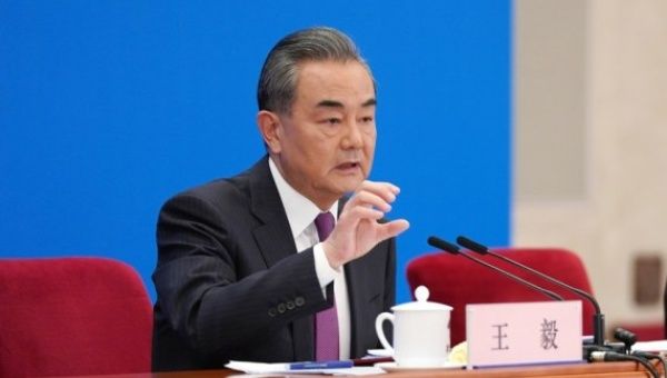 Chinese State Councilor and Foreign Minister Wang Yi attends a press conference on China's foreign policy and foreign relations via video link on the sidelines of the fourth session of the 13th National People's Congress