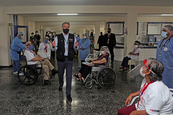 Photo courtesy of the President of Peru, Francisco Sagasti, visiting the Canevaro Home for the elderly to verify the vaccination operation carried out by the Ministry of Health, in Lima.
