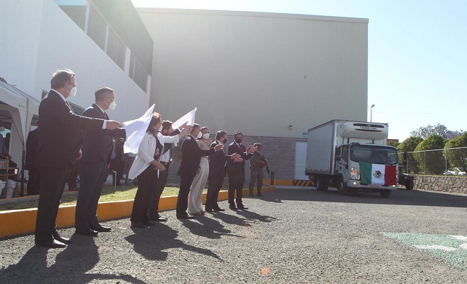 Officials send off trucks with the first CanSino doses, Queretaro, Mexico, March 22, 2021.