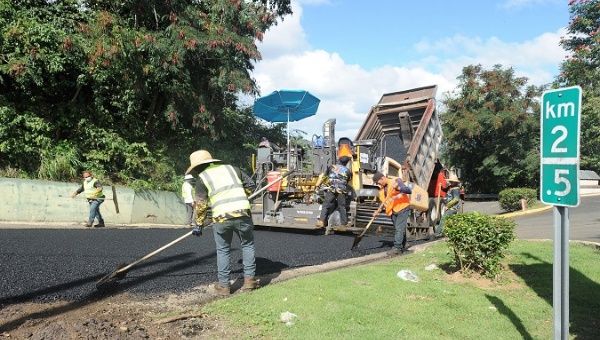 A brigade repairs roads in Rio Cañas, Puerto Rico, March. 2, 2021.