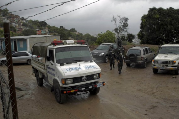 Honduran authorities help residents to evacuate from an area of possible landslides due to the constant rains caused by hurricane Iota, in Tegucigalpa, Honduras, on November 17, 2020.