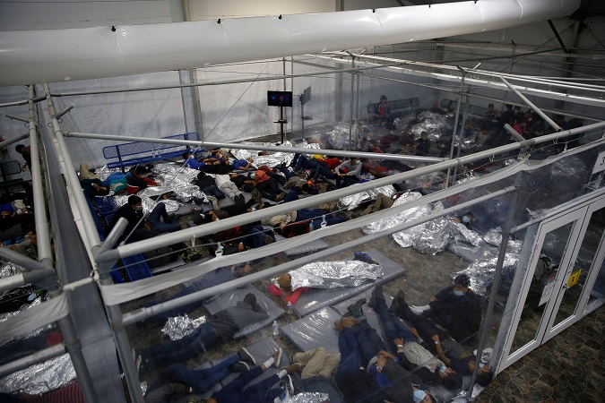 Migrant children and families at the Donna detention facility in Texas on March 30, 2021.